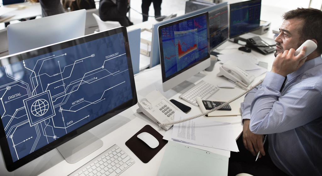 Voip Phone Systems For Small Business A helpdesk personnel talking to someone over a desktop voip phone system